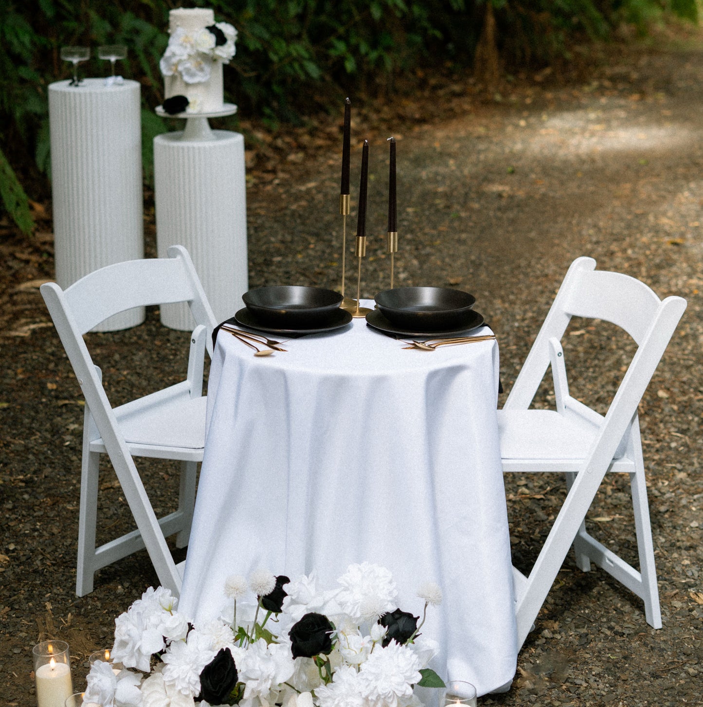 elopement package set up table and faux flowers wicker and white warwick
