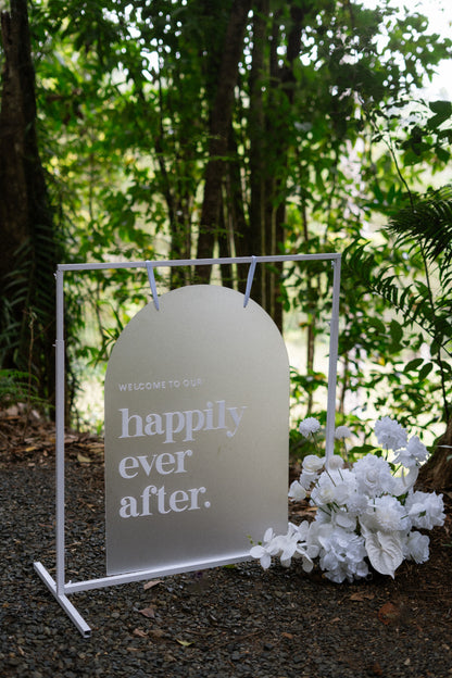 elopement package set up custom sign a faux flowers wicker and white warwick